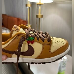 Nike Retro Dunk Low Dessert Ochre Sneakers with Cherry Charm